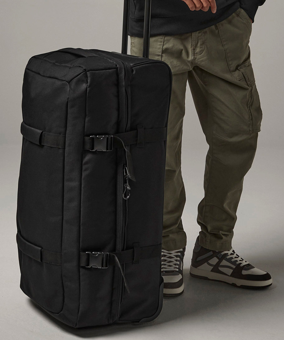 Bagbase Escape check-in wheelie in Black, lifestyle photo