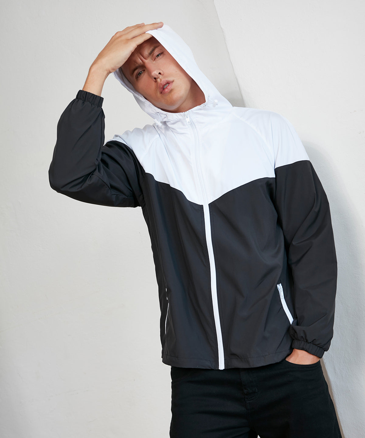 Build Your Brand Two-tone tech windrunner jacket in Black/White, lifestyle photo