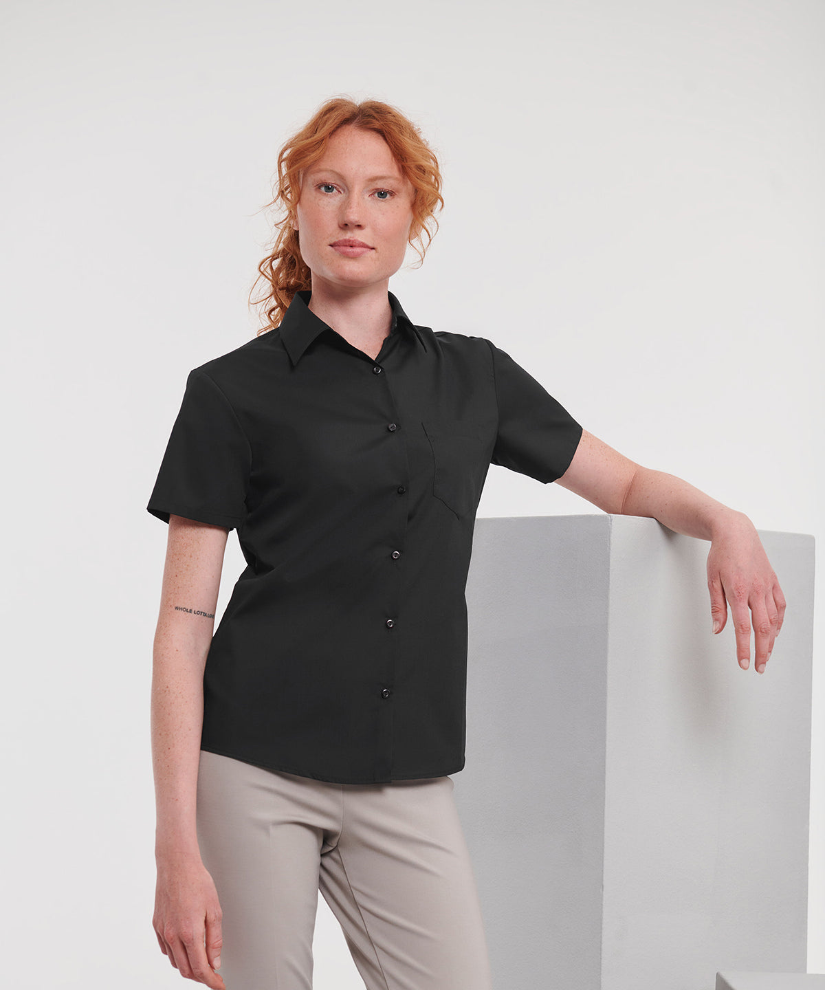 Russell Athletic Collection Women's short sleeve polycotton easycare poplin shirt, lifestyle photo