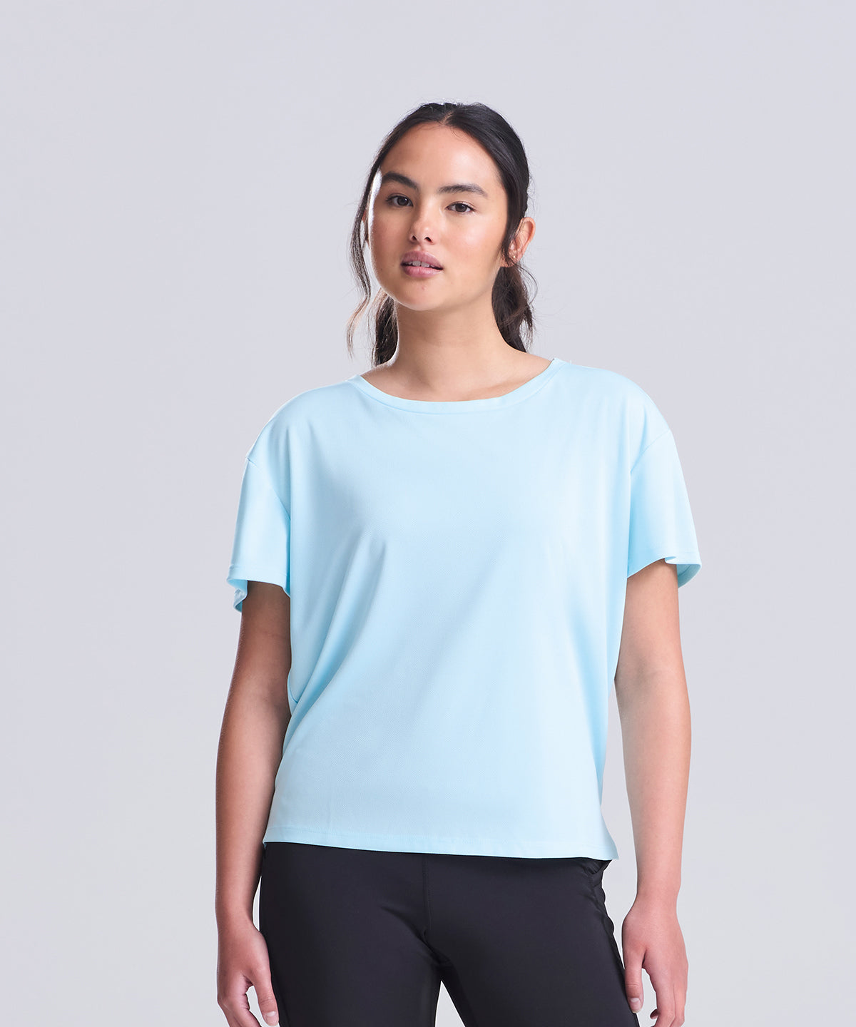 AWDis Just Cool Women’s open back T, lifestyle photo