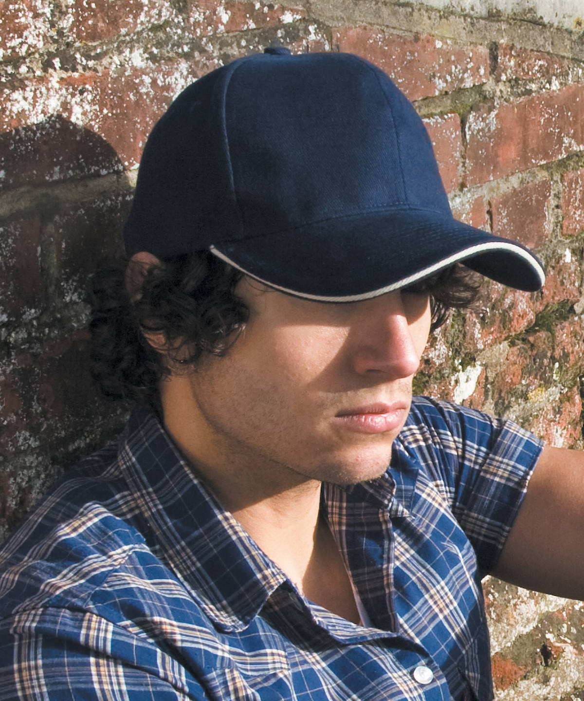 Result Headwear Pro-style heavy cotton cap with sandwich peak, lifestyle photo