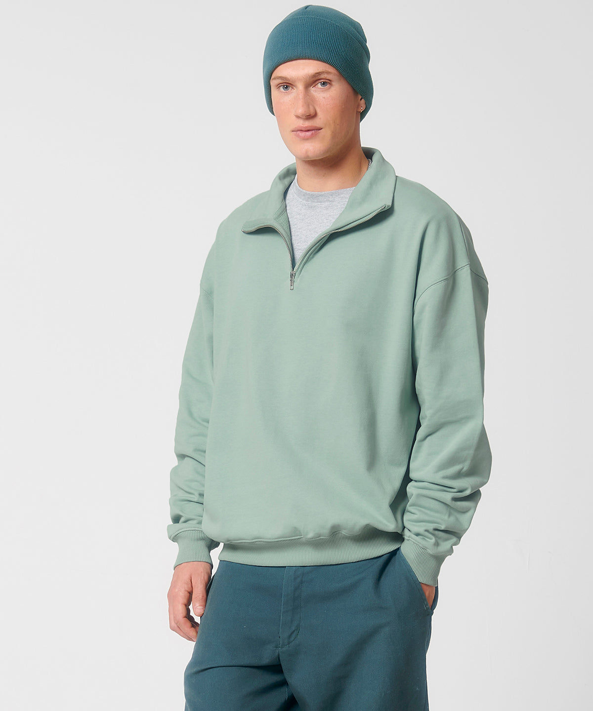 Stanley/Stella Unisex Miller dry 1/4 zip sweatshirt, lifestyle photo