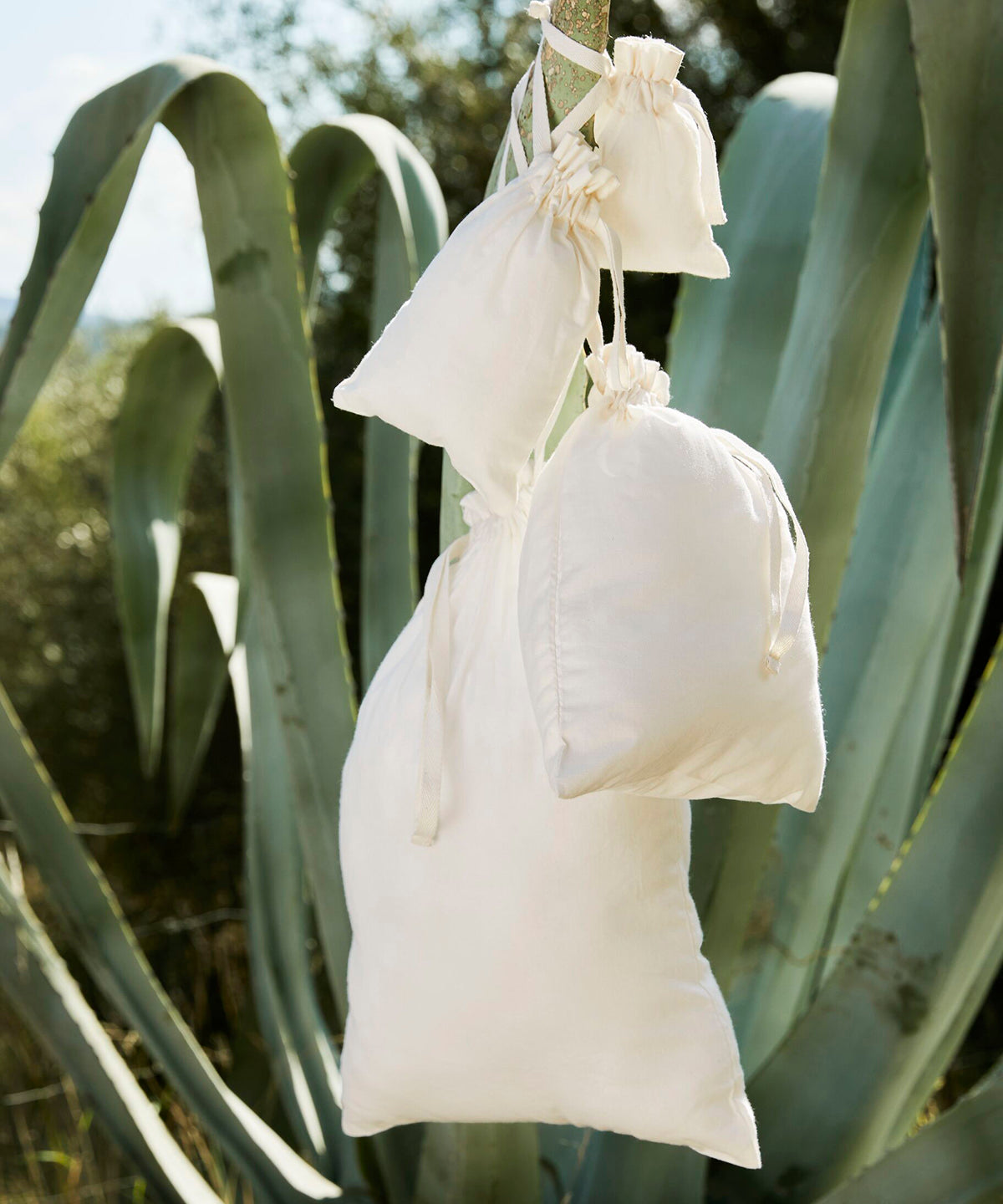 Westford Mill Organic cotton drawcord bag in Natural, lifestyle photo