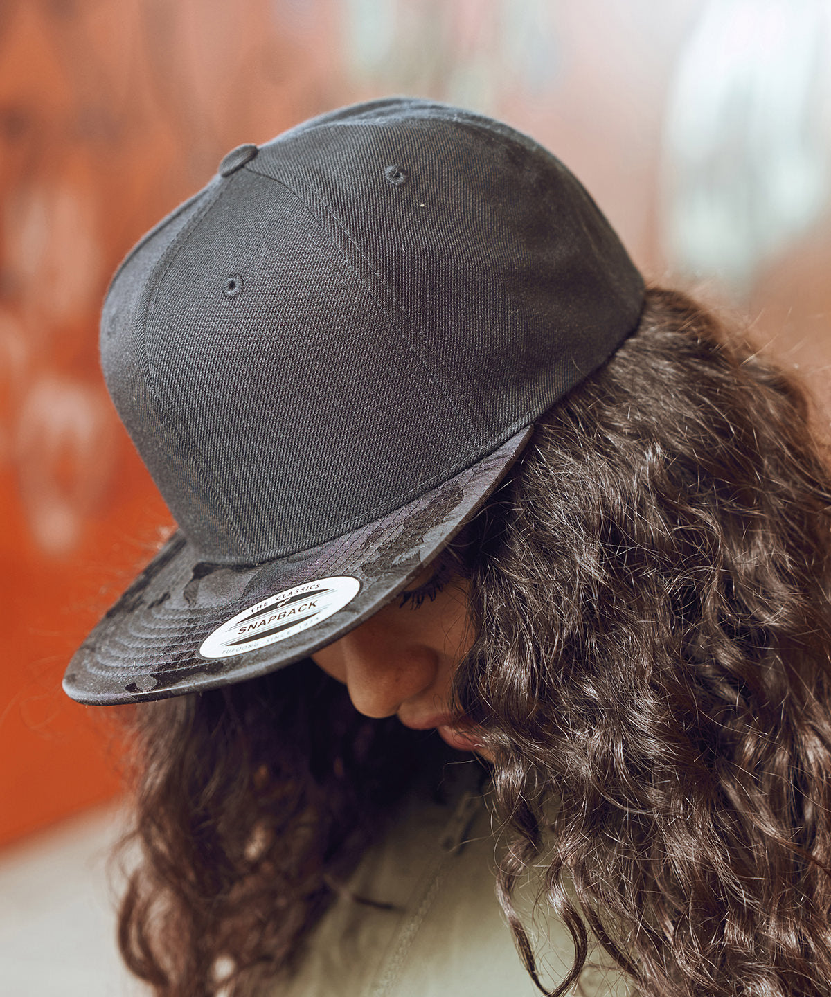 Flexfit by Yupoong Camo visor snapback, lifestyle photo