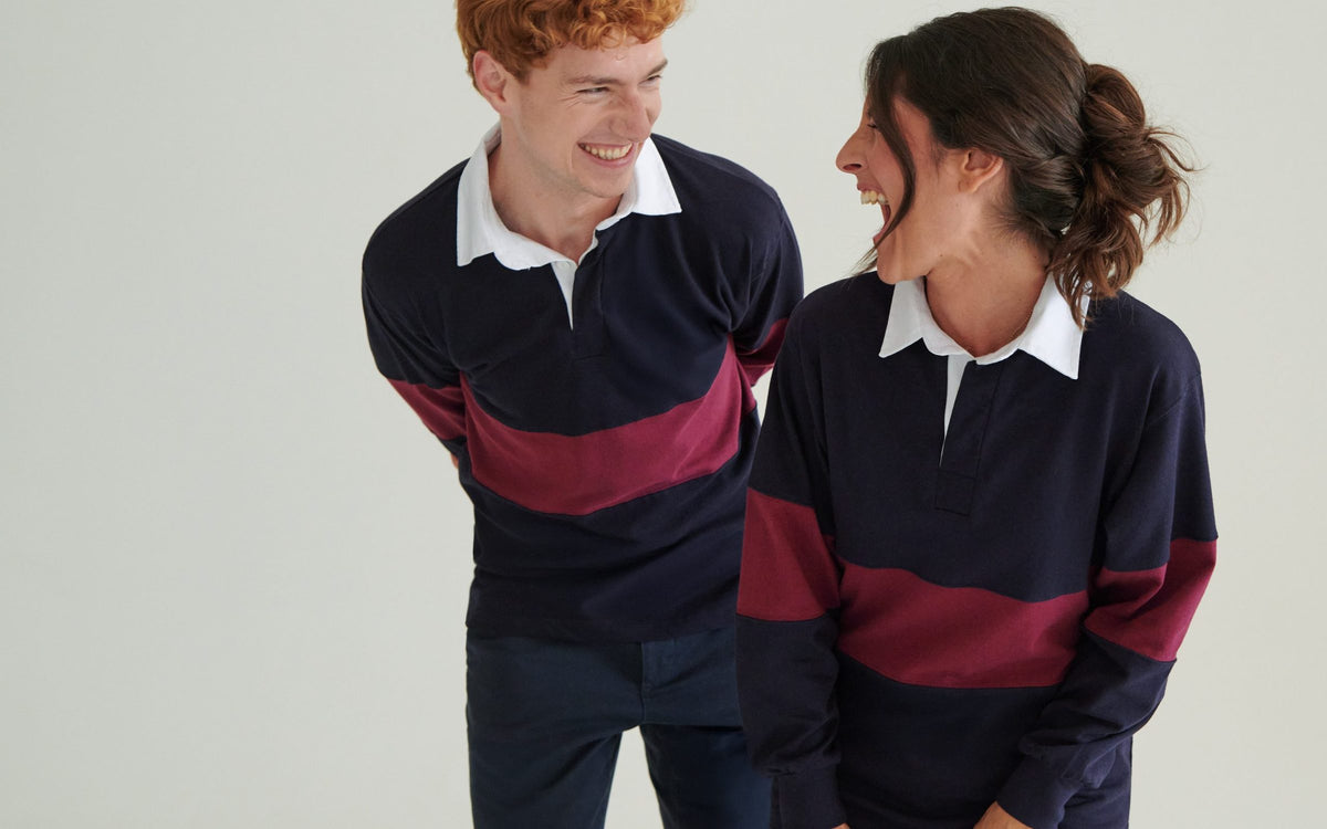 Two people in Front Row striped rugby shirts